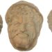 Patru măști în miniatură, probabil satiri, descoperite într-un fost oraș roman din Iordania